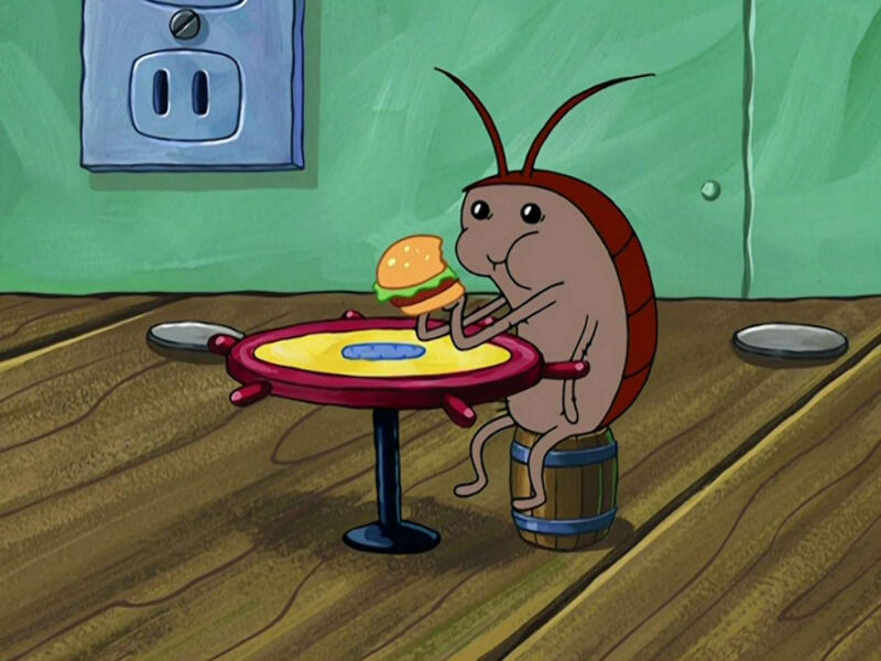Roach eating a burger.